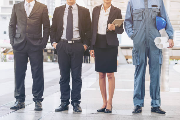 istock Group of engineer and business people 675458888