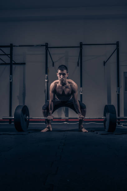 istock one young adult man bodybuilder, shouting screaming deadlift 675458916