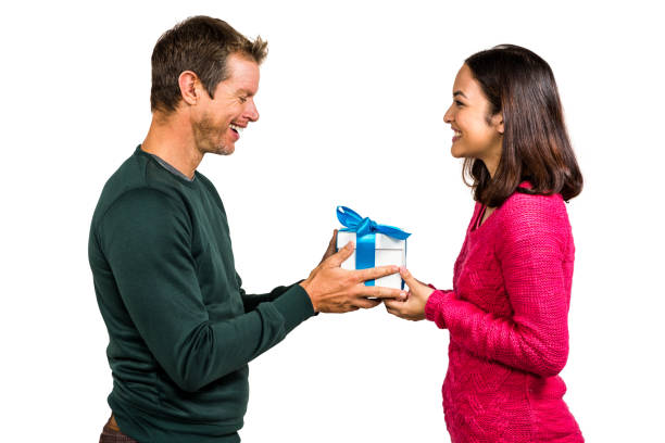 istock Girlfriend taking gift from boyfriend 675462120