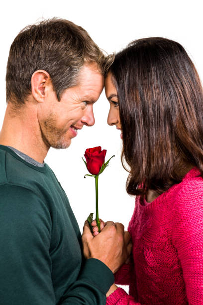 istock Happy couple with red rose 675462628