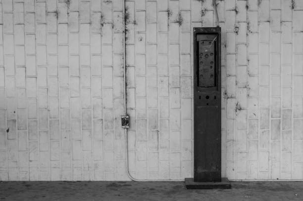 istock Remnants of a pay phone in black and white 675466216