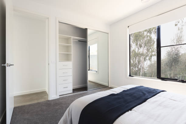 Mirrored wardrobe detail in a bedroom with a view stock photo