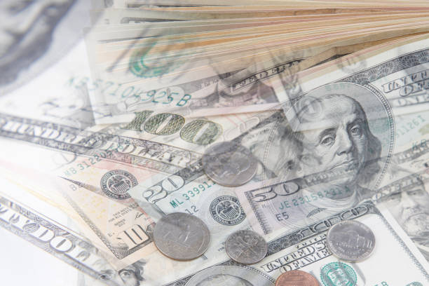 istock American coins and banknotes 675469344