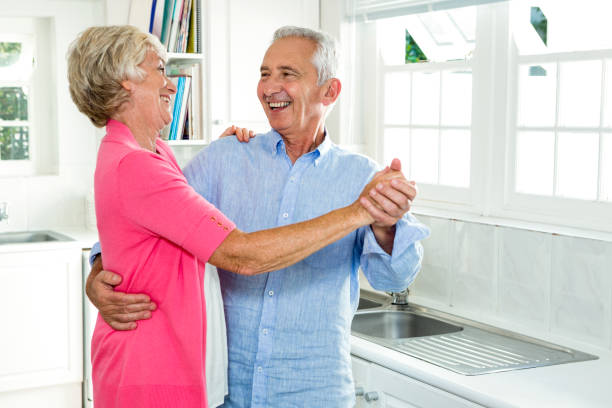 istock Cheerful senior couple dancing 675472494