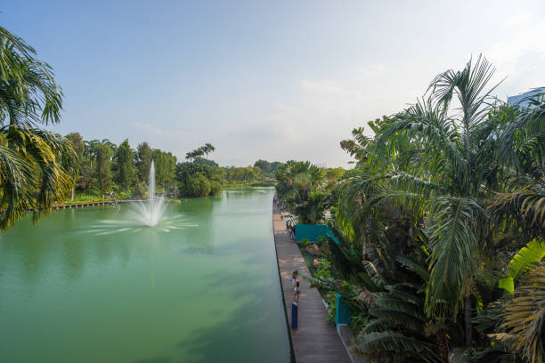 Gardens by the Bay park at Marina Bay, Singapore Singapore: Gardens by the Bay park at Marina Bay, Singapore. The park consists of three waterfront gardens: South , East , Central GardensSingapore: Gardens by the Bay park at Marina Bay, Singapore. The park consists of three waterfront gardens: South , East , Central Gardens gardens-by-the-bay-dome stock pictures, royalty-free photos & images