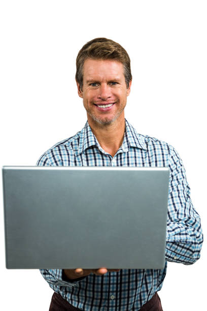 istock Portrait of happy man using laptop 675485018
