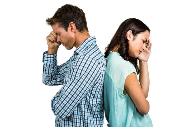 istock Depressed couple standing back to back 675485596