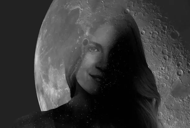 Double Exposure of woman and moon