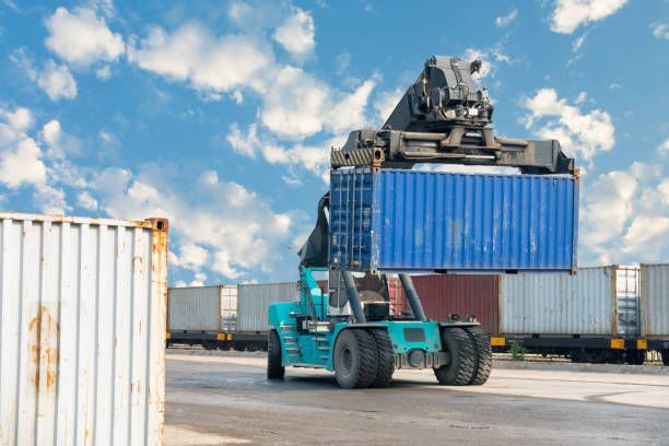 istock Container lifting truck in the storage yard. 675491910