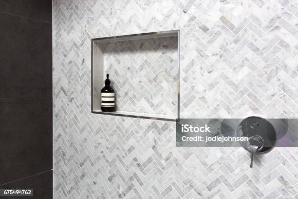 Shower Shelf Detail In Wall Of Herringbone Marble Tiles Stock Photo - Download Image Now