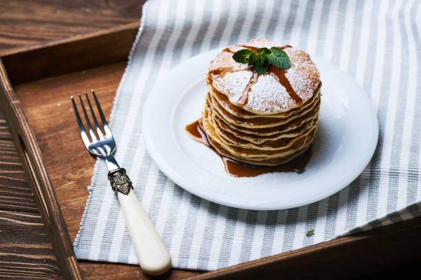 istock American pancakes on a plate with mint 675501858