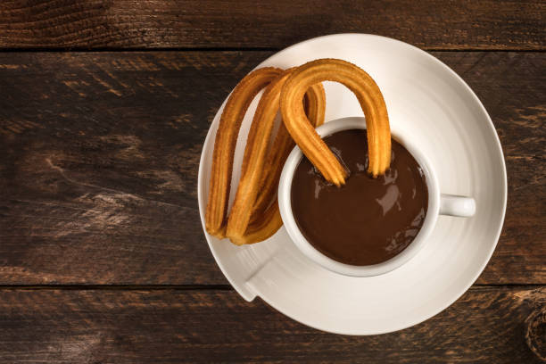 fotografie čokolády churros con, tradiční španělský dezert - dezert sladké jídlo fotky - stock snímky, obrázky a fotky