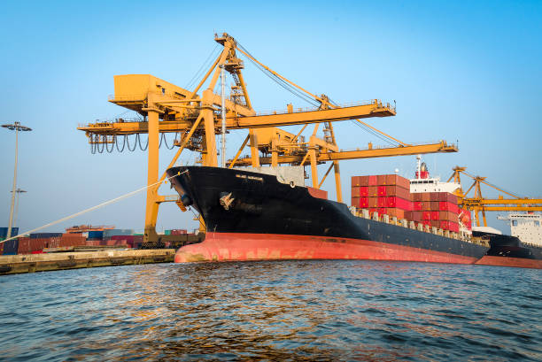 istock Container ship in port for import and export business. 675504908