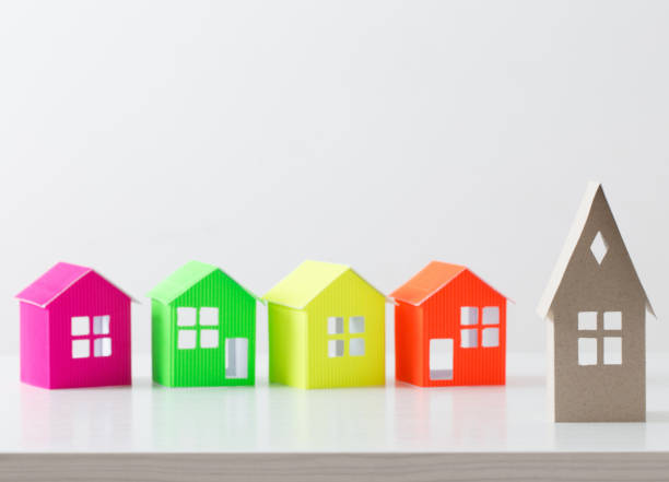 istock paper house on white background 675509374