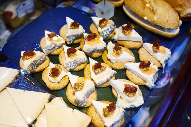 istock Sandwiches with brie cheese and vegetable on store shelves 675514746