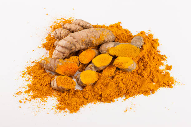 istock Turmeric roots isolated on white background 675518636