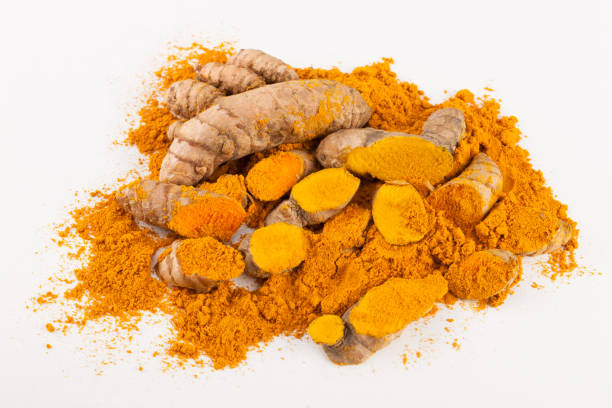 istock Turmeric roots isolated on white background 675518776
