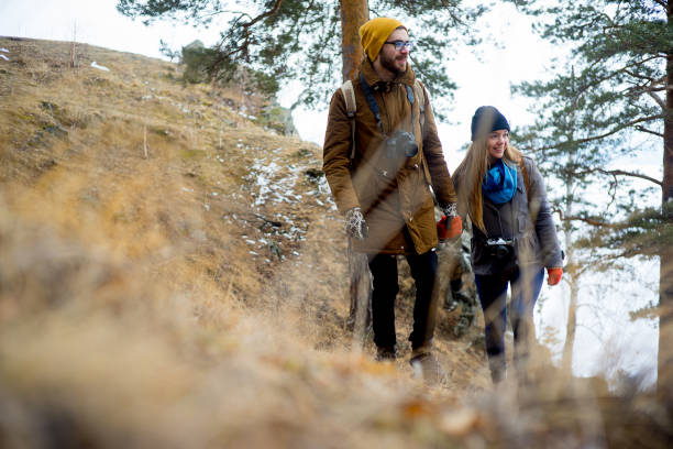istock Couple hiking in forest 675529474