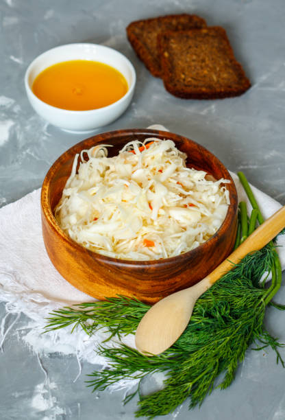 istock Sauerkraut in wooden bowl 675529482