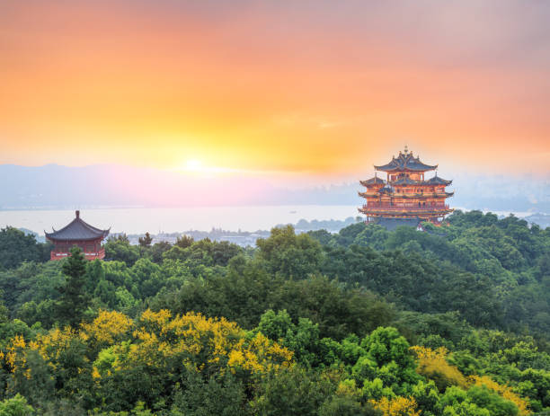 istock Beautiful Hangzhou West Lake and ancient pavilion architectural scenery at sunset 675537132