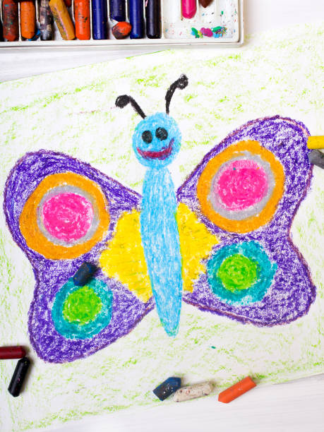 istock closeup of a drawing: happy butterfly with colorful wings 675547482