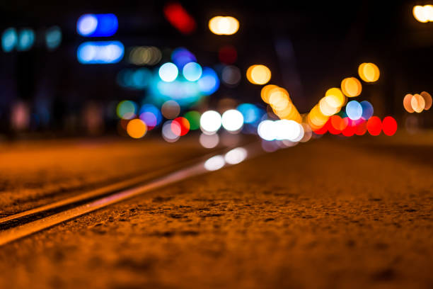 istock Night highway with rails, cars go over it 675550140