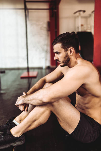 istock man resting in the gym after the training 675552906