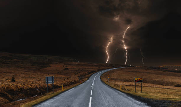 istock The road with powerful thunderstorm landscaped 675563058