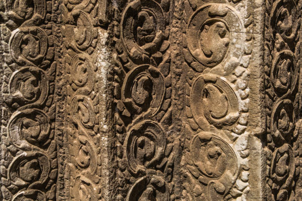 istock Ta Prohm temple beautiful ancient bas-relief in Angkor, Siem Reap, Cambodia. 675567780