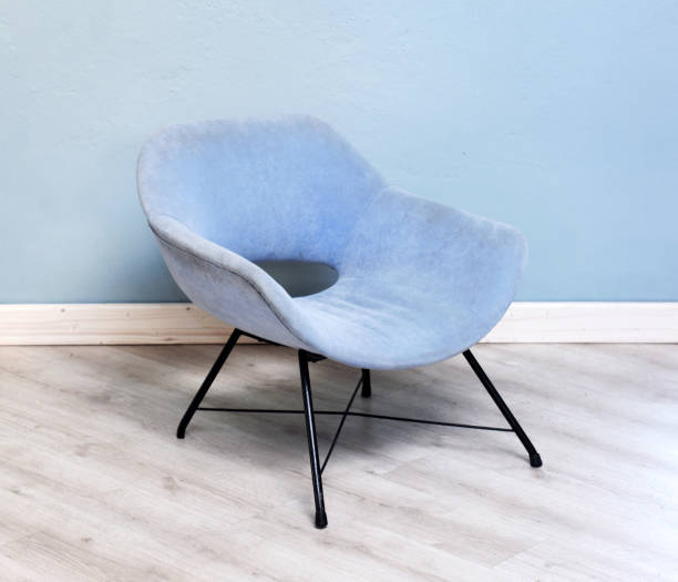 istock Upholstered vintage blue velvet armchair 675570858