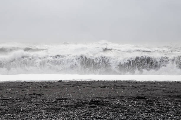 istock Waves, black sand beach in Dyrholaey near Vik, Iceland. 675574088