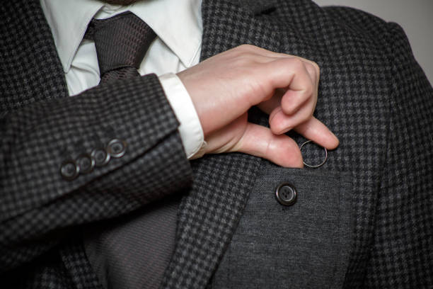 istock Man hides an engagement ring in his pocket 675587868