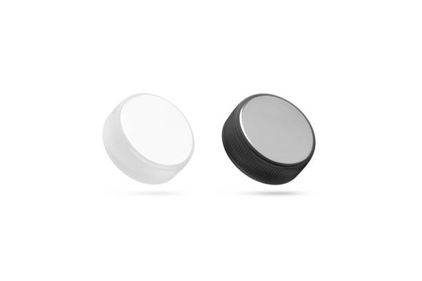 istock Blank plastic bottle caps mock up set isolated, black white 675590082
