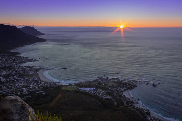 istock Sunset over the ocean from Table Mountain, Cape Town 675592990