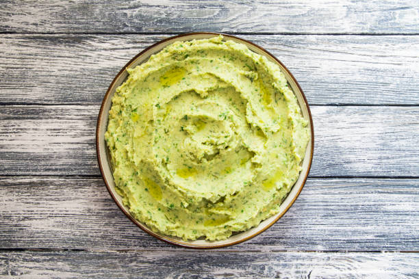 Healthy avocado hummus with olive oil. vegetarian concept. selective focus stock photo