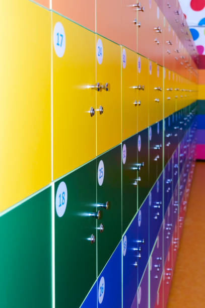 istock The wall is decorated with multi-colored storage chambers. A variant of the interior for children's rooms, shops, gambling halls. Numbered cell storage in a baggage room 675598010