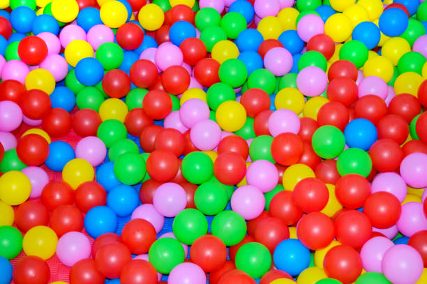 istock Many multi-colored plastic balls. For children's rooms, playgrounds. Background. 675598016