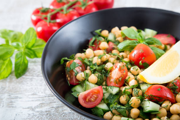 istock fresh vegetarian salad of chickpeas and vegetables 675598432