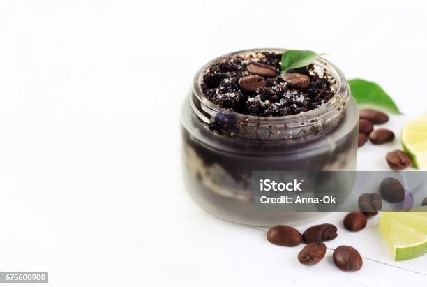 Cosmetic Matte Glass Jar Of Coffee Grounds Natural Scrub Mixed With Sugar Stock Photo - Download Image Now