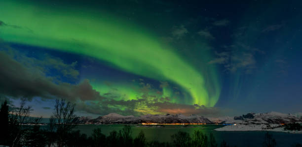 istock Aurora Northern Polar light in night sky over Northern Norway 675605664