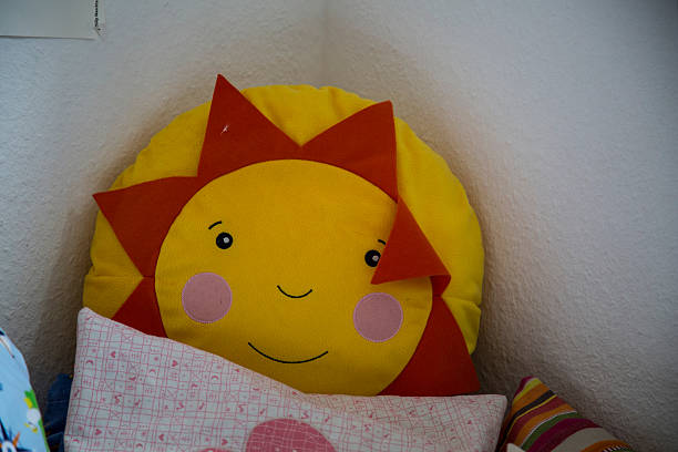 istock Soft Toy Cushions In Bedroom Corner 675619487