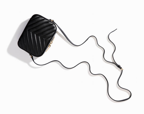 Black leather crossbody bag isolated on white background ( with clipping path)
