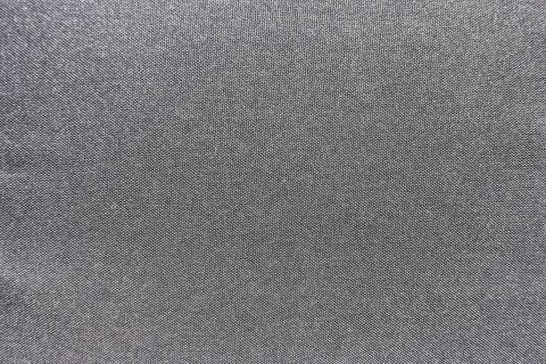 istock Beautiful light and shadow on Reflective fabric canvas, Empty Black surface with gray dots spread throughout the area 675631982