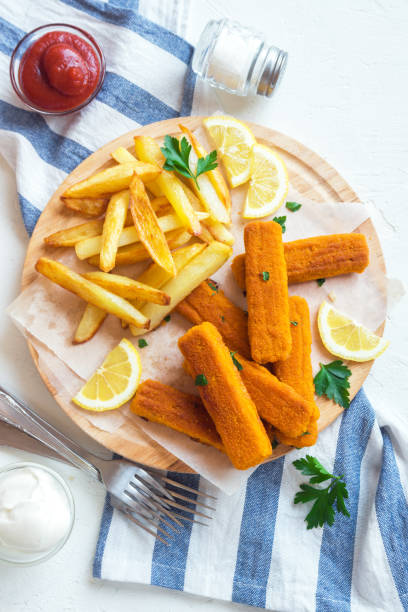 istock Fried Fish Sticks with French Fries 675631994