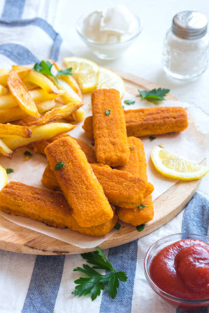 istock Fried Fish Sticks with French Fries 675632032