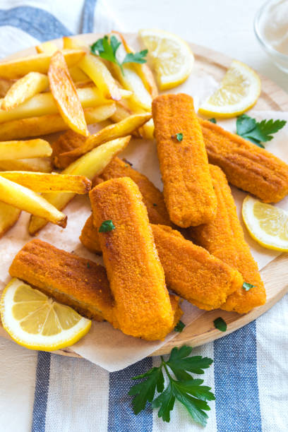 istock Fried Fish Sticks with French Fries 675632050