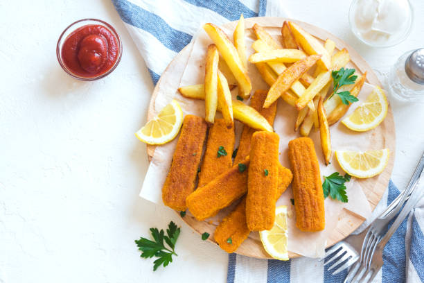 istock Fried Fish Sticks with French Fries 675632058