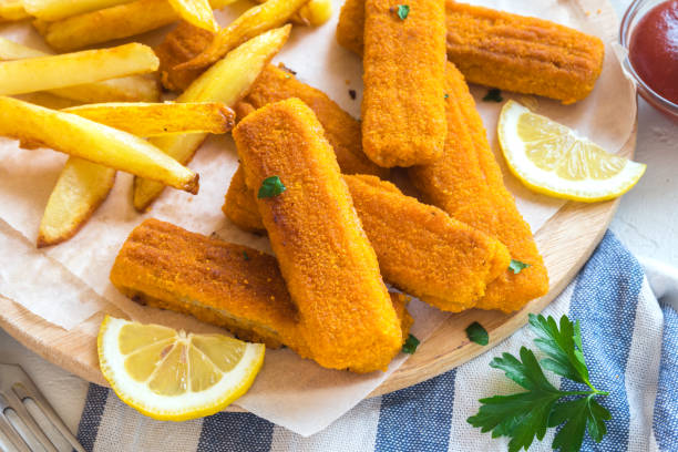 istock Fried Fish Sticks with French Fries 675632062