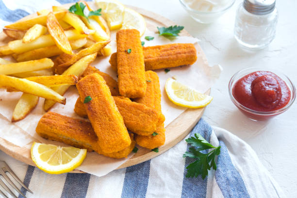 istock Fried Fish Sticks with French Fries 675632118