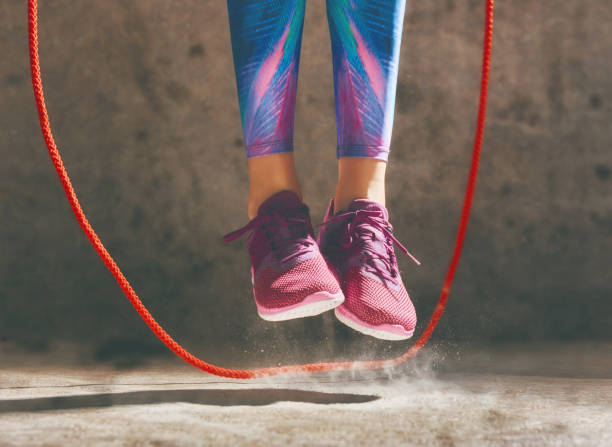 istock Woman with skipping rope. 675632404